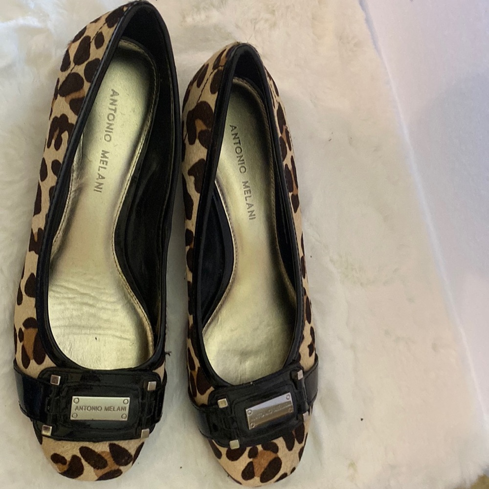 Animal print low wedge shoes.